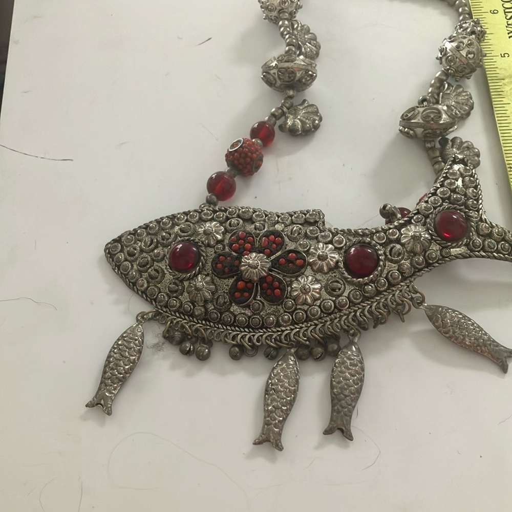 Intricate fish necklace